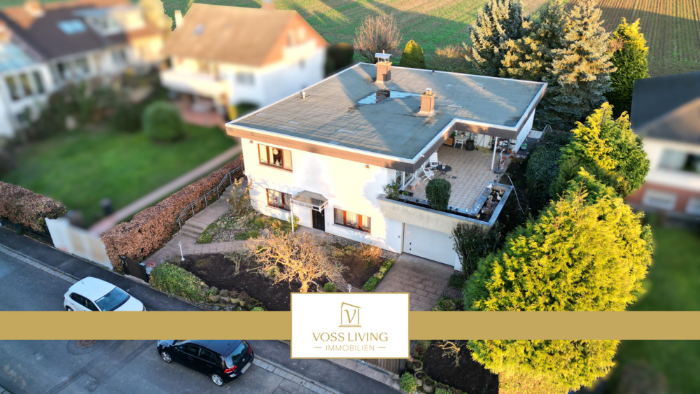 Repräsentativer Bungalow mit Einliegerwohnung, Doppelgarage + großer Terrasse in Toplage von Karben 8 zimmer