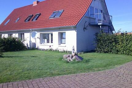 Haus am Breeger Bodden mit drei Wohneinheiten zimmer