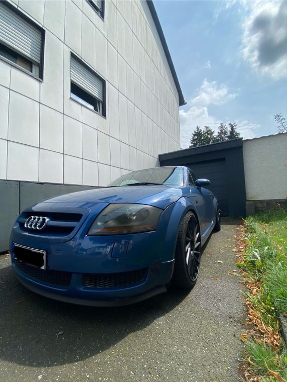 TT