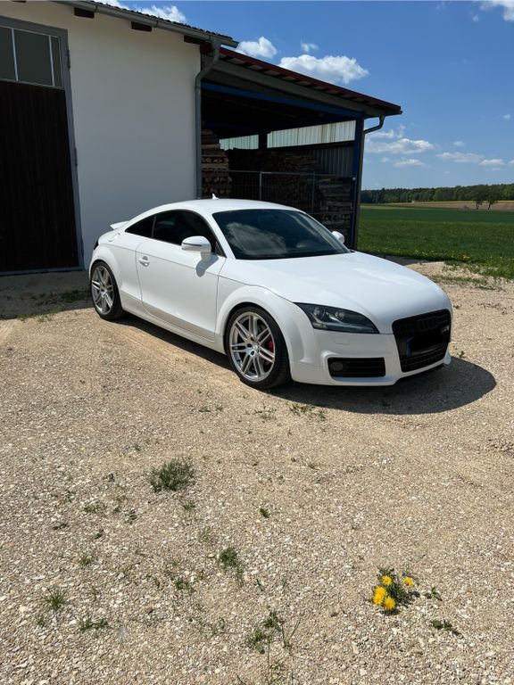 TT