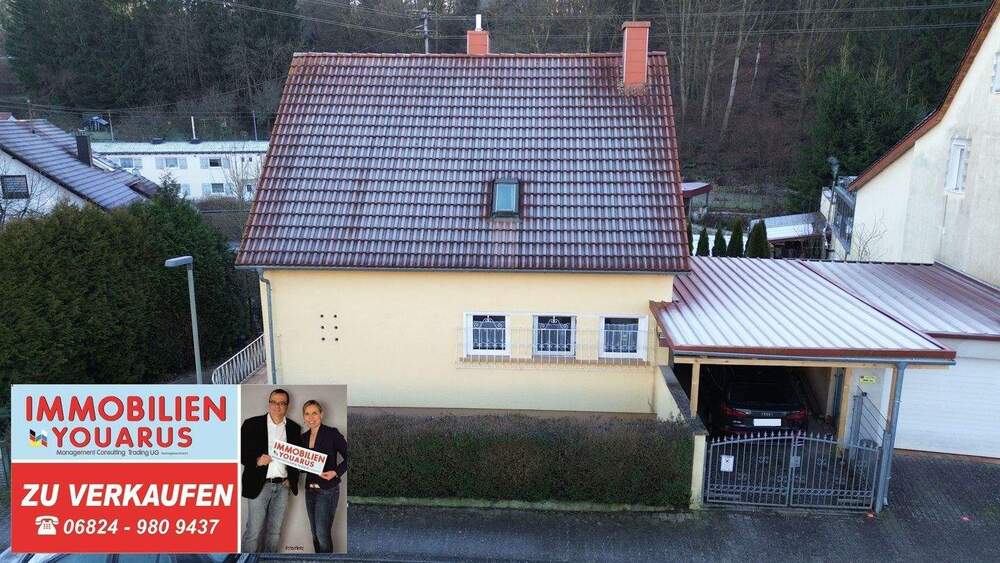 Freistehendes Einfamilienhaus mit Einfahrt zur Garage, Carport, Balkon, Garten, Keller in Ottweiler 5 zimmer