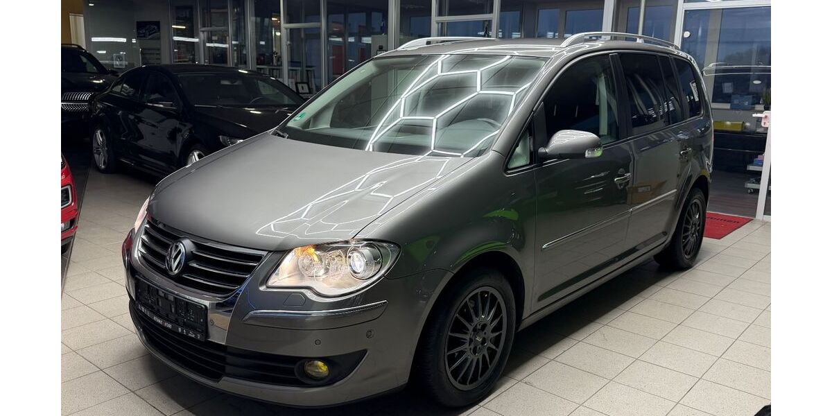 VW Touran 127.205 km 6.499 &euro; Niestetal 34266