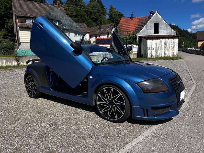 TT