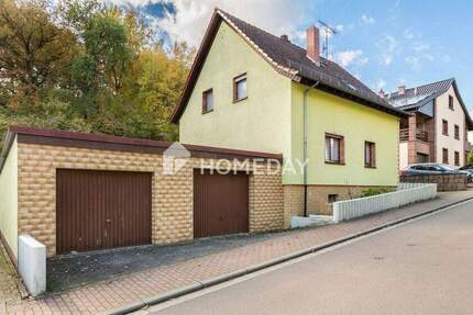 Zwei Balkone, großer Garten, Doppelgarage: Ihr Familiendomizil in Contwig 5 zimmer