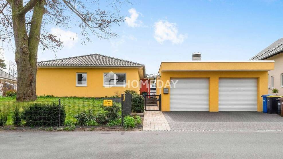 Top gepflegter Bungalow mit Doppelgarage, großem Grundstück, EBK und Extras in idyllischer Lage