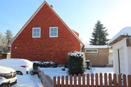 Charmante Doppelhaushälfte mit Garage und Carport - perfekt für Ihre Familie 7 zimmer