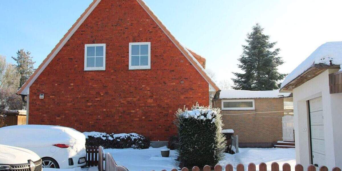 Charmante Doppelhaushälfte mit Garage und Carport - perfekt für Ihre Familie 7 zimmer