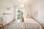 3 Zimmer-Wohnung mit Garten, Einbauküche und Tiefgaragenstellplatz in beliebter Lage