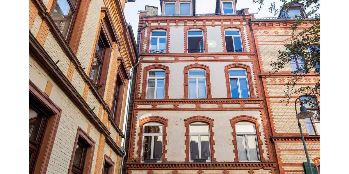 Mehrfamilienhaus mit zwei Gewerbeeinheiten in zentraler Innenstadtlage 2 zimmer