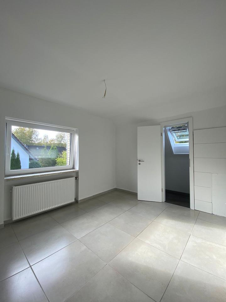 Moderne 3-Zimmer-Wohnung mit Dachterrasse und Tiefgarage in Arpke zimmer