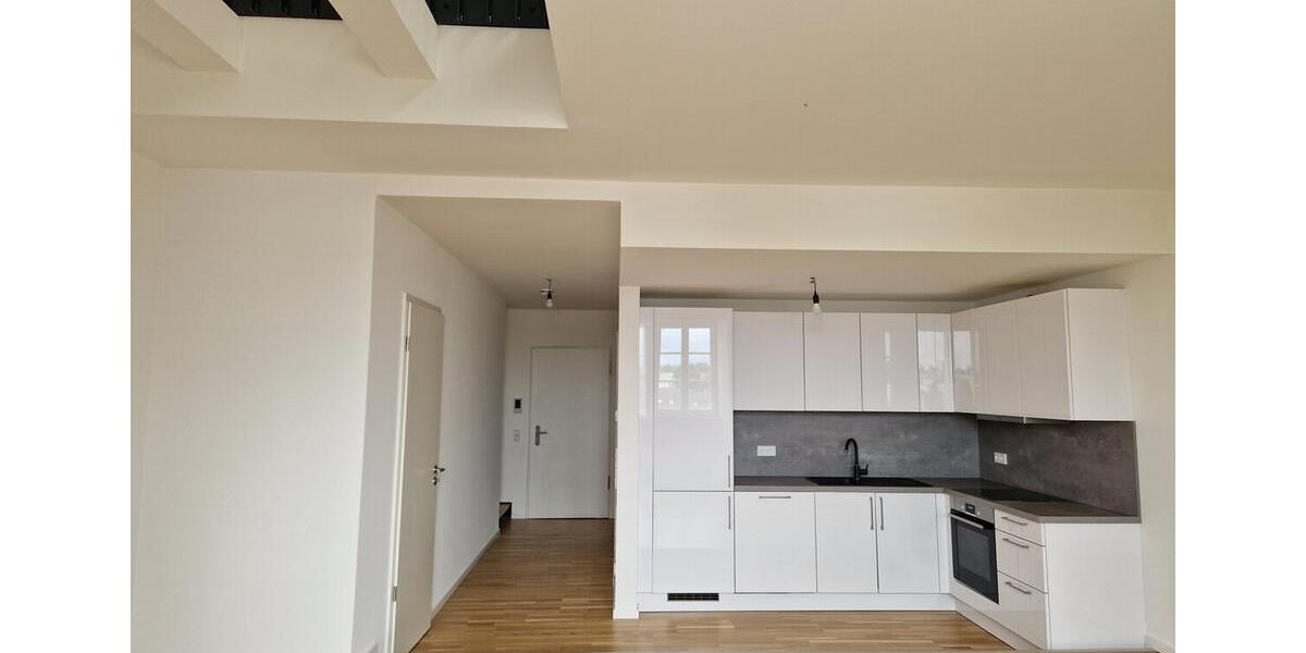 Zentrumsnahe Galeriewohnung mit Einbauküche und Tiefgarage 2 zimmer