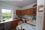 Walmdachbungalow in Marne - Stilvolles Wohnen mit Gartenblick und Wintergarten! - Bungalow Marne | Angebot:26835885