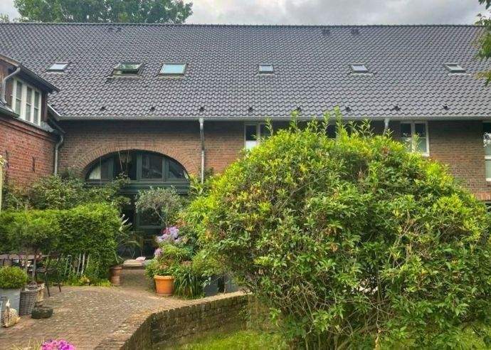 Lichtdurchflutete-2,5-Zi-Terrassenwohnung-mit-Garten-im-exclusiven-Vierkanthof 2 zimmer