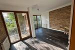 Stilvolle 4-Zimmer Garten-Wohnung mit Einbauküche und Tiefgarage