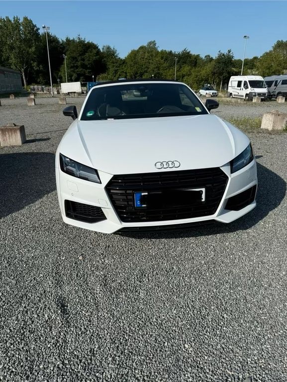 TT