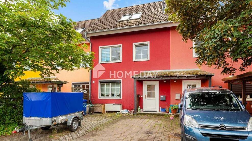 Familienfreundliches Reihenmittelhaus mit 5 Zimmern und Garten in ruhigem Wohngebiet