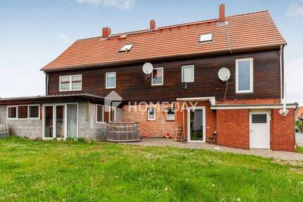 Charmantes Mehrfamilienhaus mit zwei Wohneinheiten, Garage, Carport und großzügigem Garten 8 zimmer