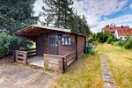 Moderne 2 Zimmer Wohnung mit Traumgarten & Garage in ruhiger Lage