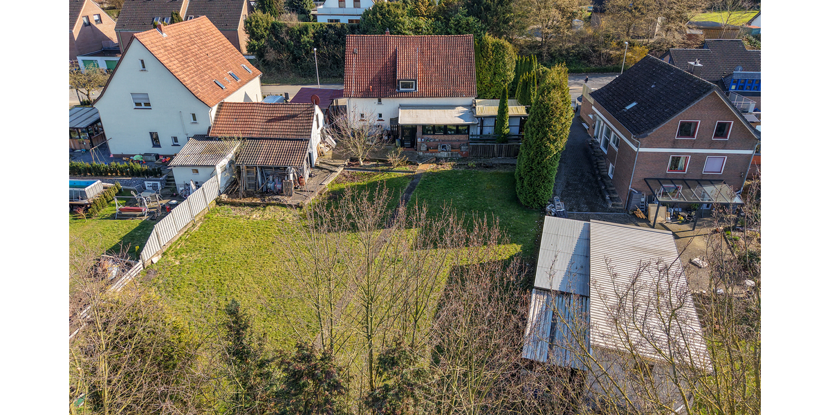 Ein- bis Zweifamilienhaus mit Wintergarten, großem Grundstück und vielseitigen Nutzungsmöglichkeiten - Zweifamilienhaus Löhne | Angebot:26381348