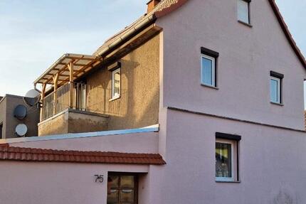 Einfamilienhaus mit Nebengebäude und Scheune zimmer