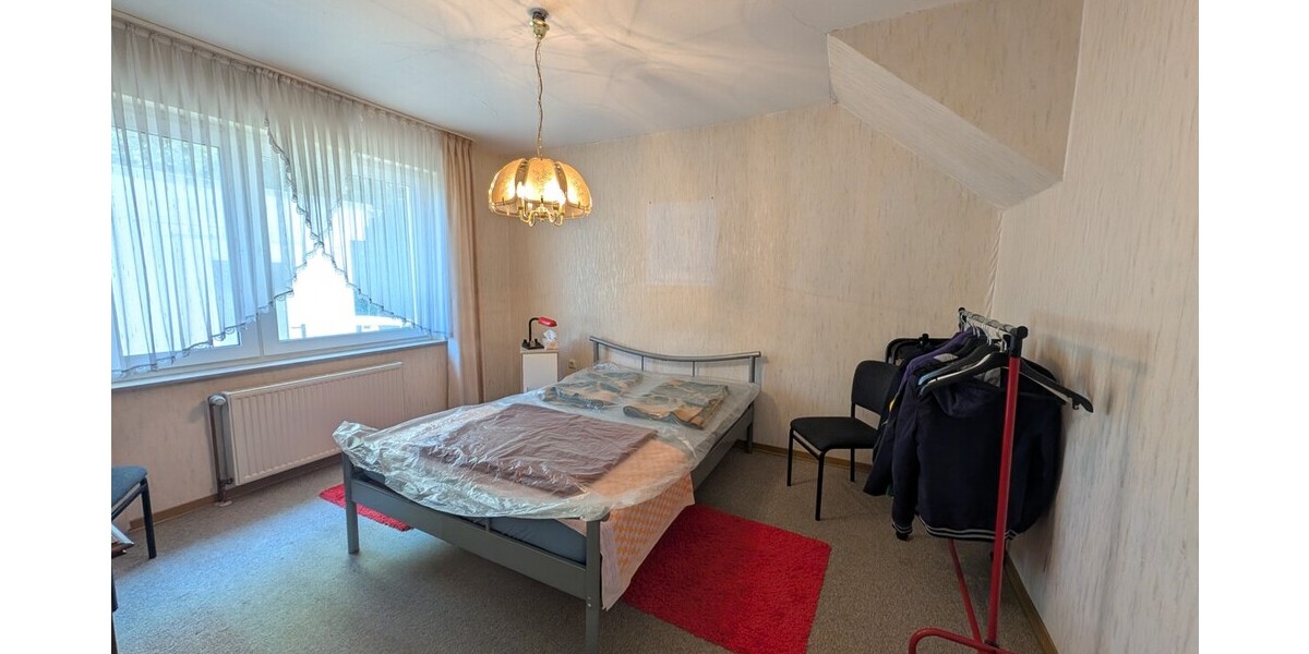 Großes Grundstück in Hüllhorst: Einfamilienhaus mit Potenzial zur Neugestaltung - Grundstück Hüllhorst | Angebot:26905367