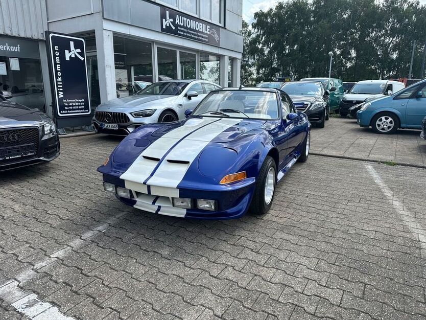 GT