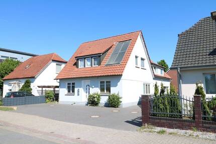 Modernisiertes, gepflegtes Mehrparteienhaus mit 4 Wohnungen und Pkw-Stellplätzen 9 zimmer