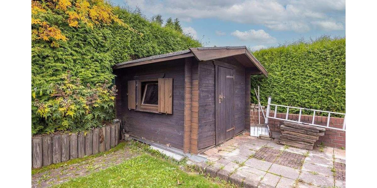 Winkelbungalow mit Einlieger, Doppelgarage, Photovoltaik und schönem Garten 6 zimmer