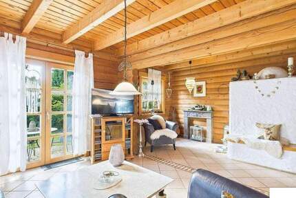 Familienfreundliches Holzhaus aus finnischem Qualitätsvollholz - großer Garten, Sauna & Kamin 6 zimmer