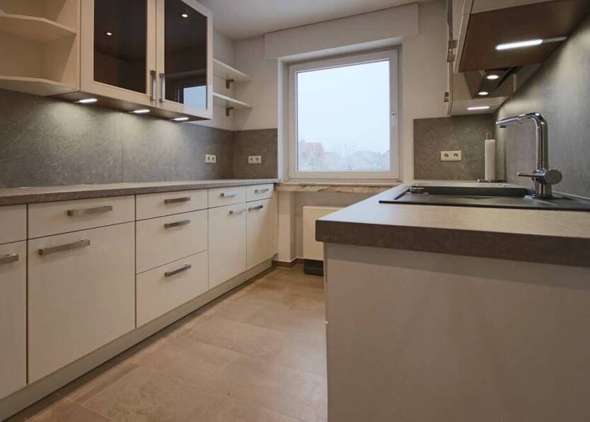 2-Zimmer-Wohnung mit Dachterrasse und Kfz-Stellplatz
