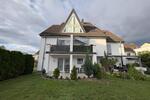 Maisonette-Traum am Rhein – stilvoll wohnen in Toplage