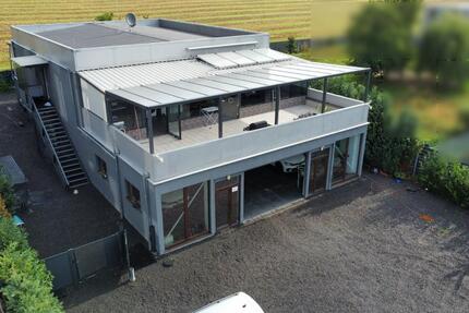 Geschäftshaus – Der Traum eines jeden Kleinunternehmers zimmer