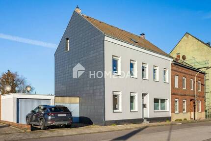 Modernisierte DHH mit Garage, Carport, Gartenhaus und Erweiterungspotential in ruhiger Lage