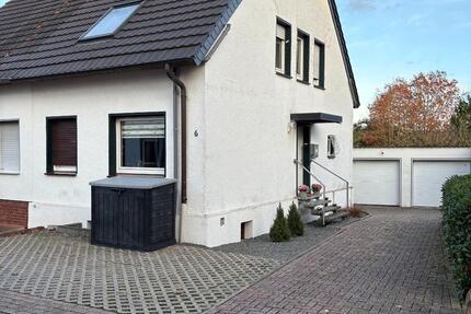 Doppelhaushäfte mit einer Garage und einem Stellplatz 4 zimmer