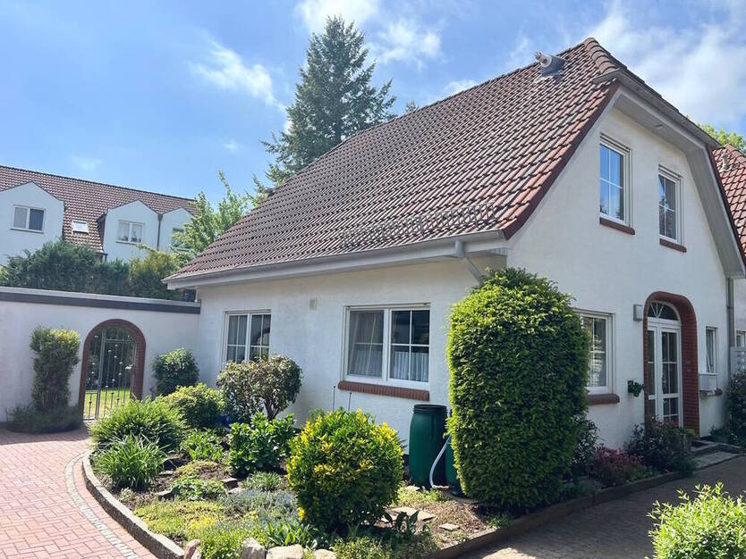 PURNHAGEN-ImmobilieN - Ritterhude - Moderne und gepflegte Doppelhaushälfte mit Garage in zweiter Reihe