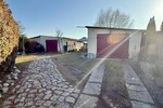 HORN IMMOBILIEN++ 15 km bis Neubrandenburg, schöne Doppelhaushälfte mit großen Grundstück & 2 Garagen - Doppelhaushälfte Bassow Bassow | Angebot:26085785