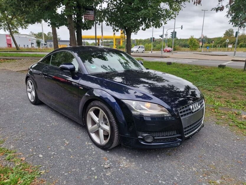 TT