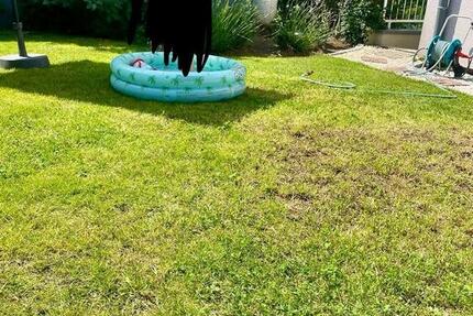 Eigentumswohnung mit Garten und 2 Stellplätzen