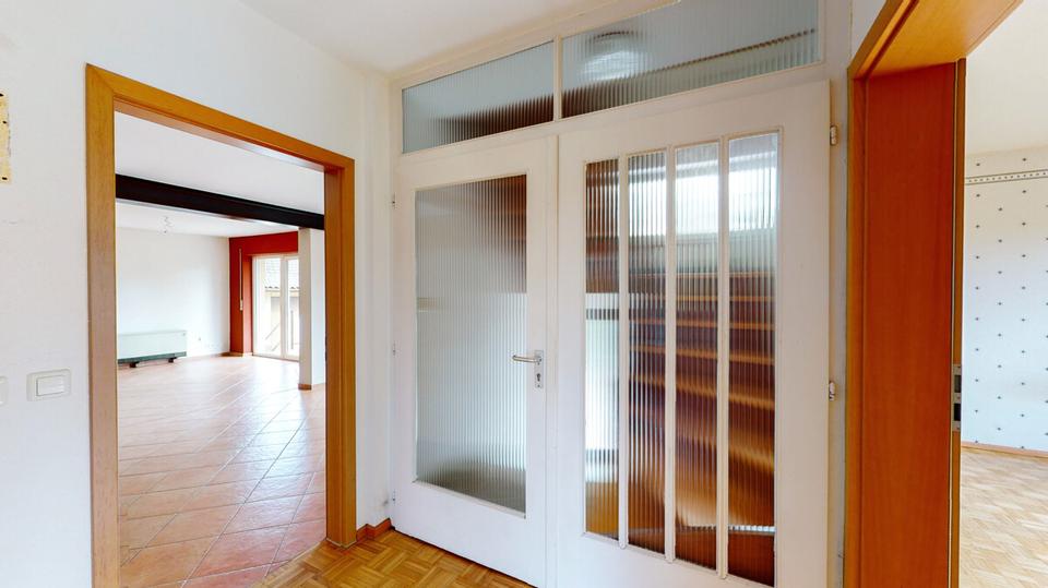 Charmante 3-Zimmer-Hochparterrewohnung mit Balkon, Garage und Gartennutzung in Au am Rhein 3 zimmer