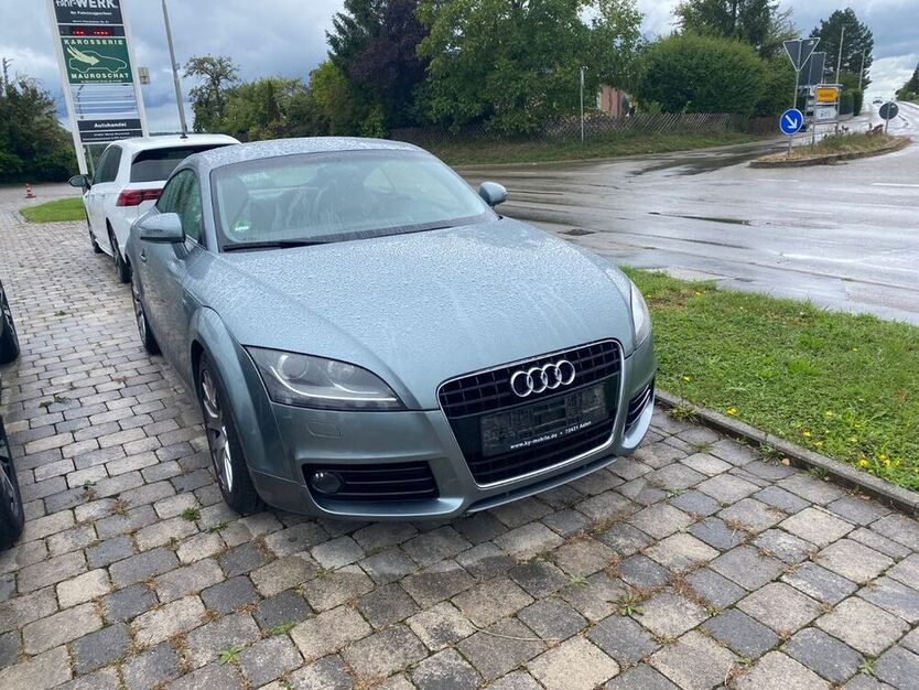TT