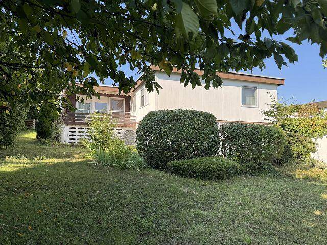 Einfamilienhaus in wunderschöner Lage und mit Gartengeschoss-Wohnung
