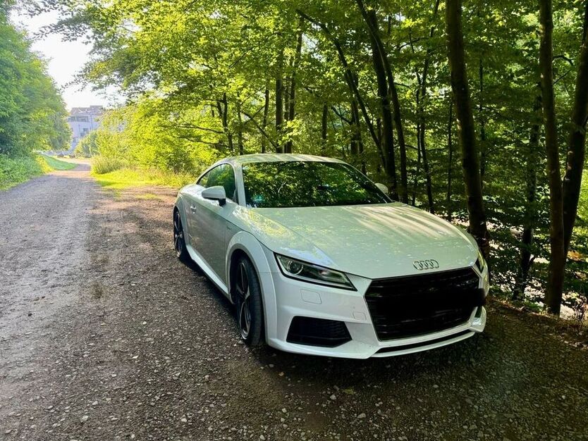 TT