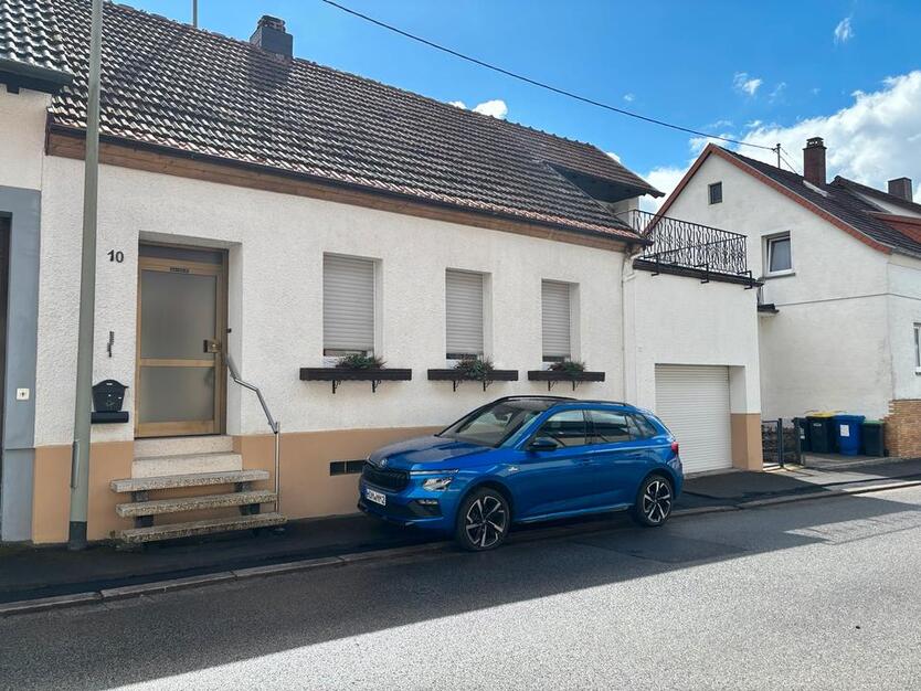 Gepflegtes 1-2 Familienhaus in NK-Münchwies mit großer Garage