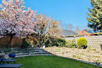 Erdgeschosswohnung mit überdachter Terrasse und Garten 4 zimmer