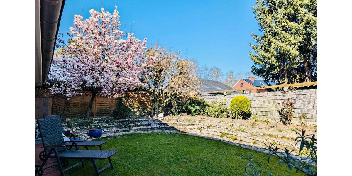 Erdgeschosswohnung mit überdachter Terrasse und Garten 4 zimmer