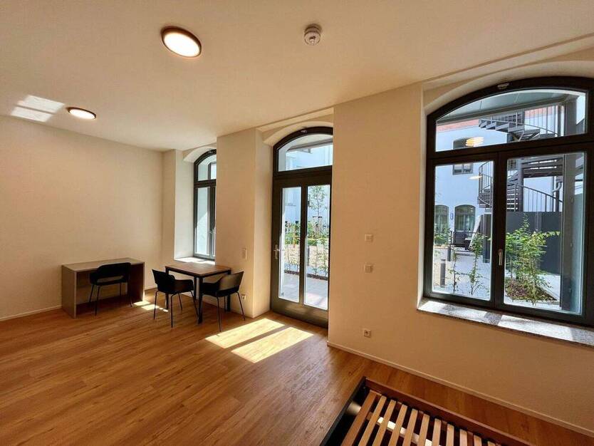 Loftige, möblierte 1-Zimmer-Wohnung mit großer Terrasse zum Erstbezug!