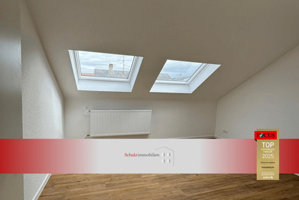 Kernsaniert: 2-Zimmer-Dachgeschosswohnung in gepflegtem Mehrfamilienhaus auf der Parkinsel 2 zimmer