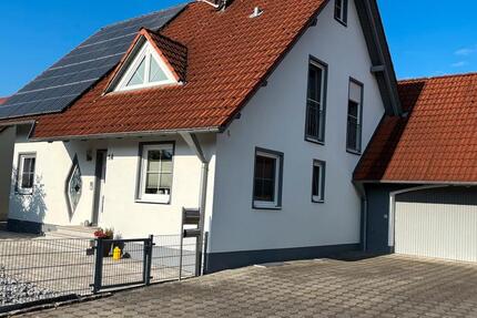 Modernes Einfamilienhaus mit schönem Garten zimmer