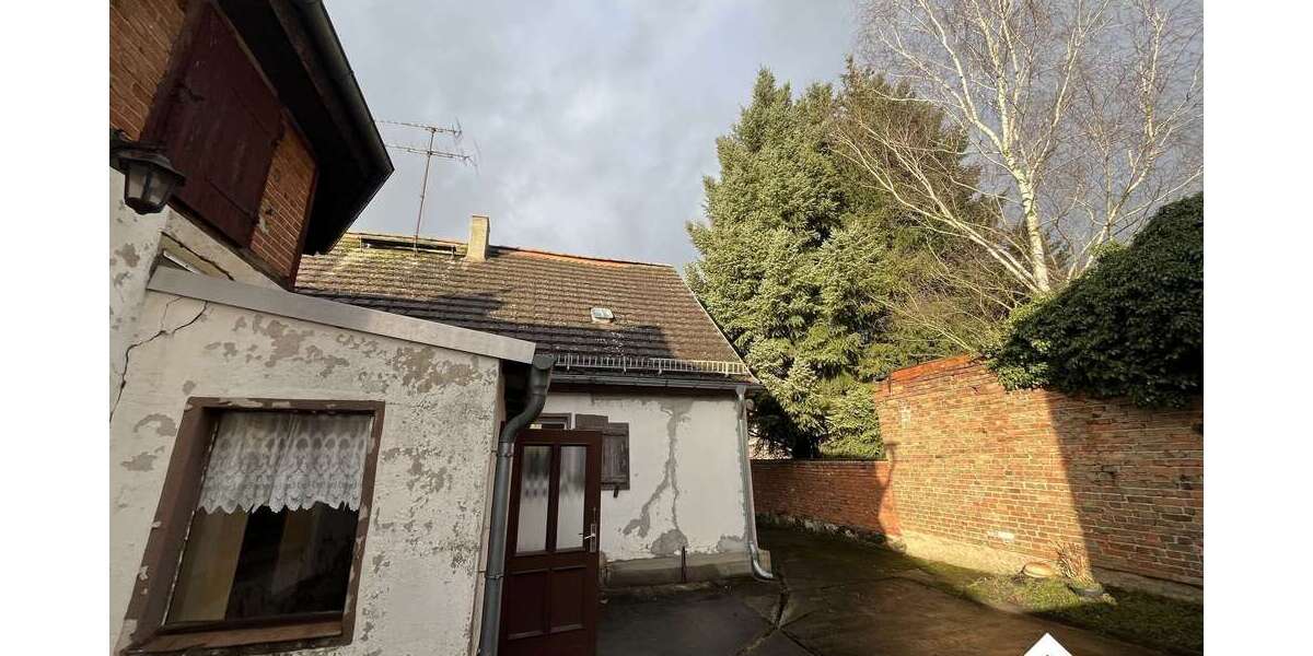 Einfamilienhaus mit viel Potenzial, großem Grundstück und vielseitig nutzbarem Nebengebäude - Einfamilienhaus Grimme Grimme | Angebot:25717453