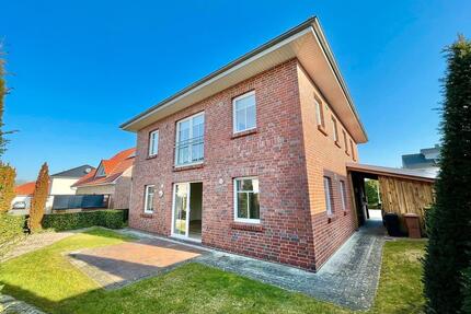 Dein Traumzuhause: Exklusive EG-Wohnung mit Terrasse, Garten & Carport
